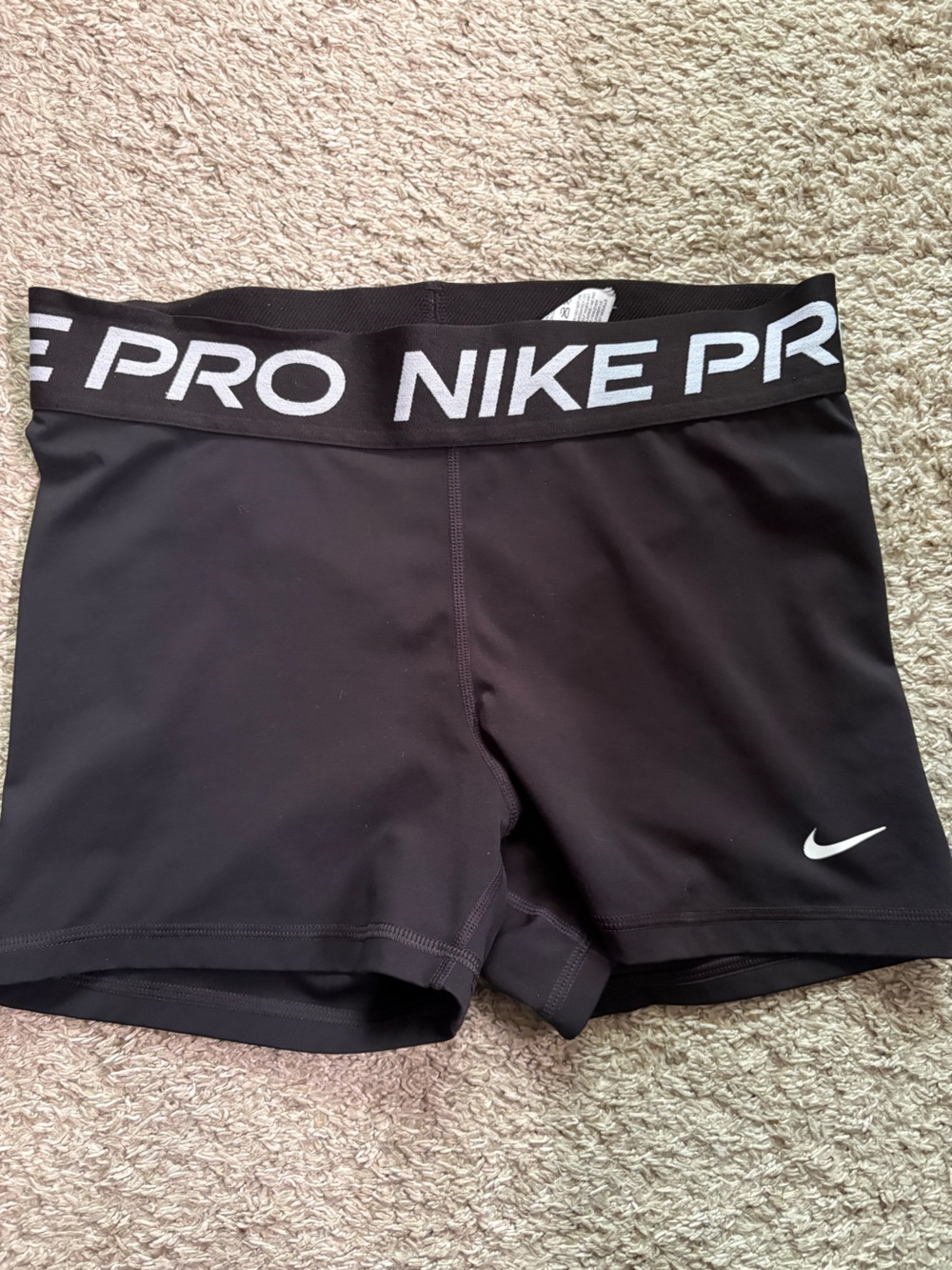 Nike Black Compression Shorts with White Swoosh Detail